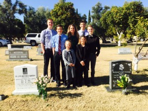 Me with my kids, standing between my sisters' graves. Death has definitely created some pretty tough whirlwinds for our family.