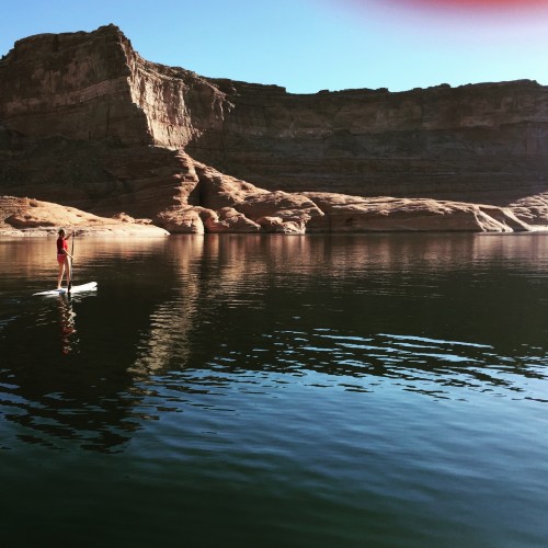 Paddle-boarding on a still lake at dawn--peaceful, quiet, ready to listen.